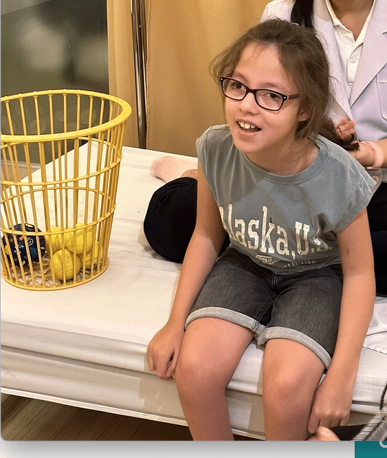 11 year old cerebral palsy patient getting rehabilitation.